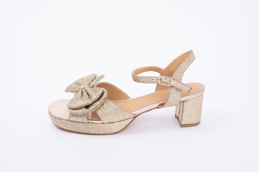 Side view of Rhian Sandal in Gold. A heeled womens shoe with bow detail available in larger sizes. UK 8-12