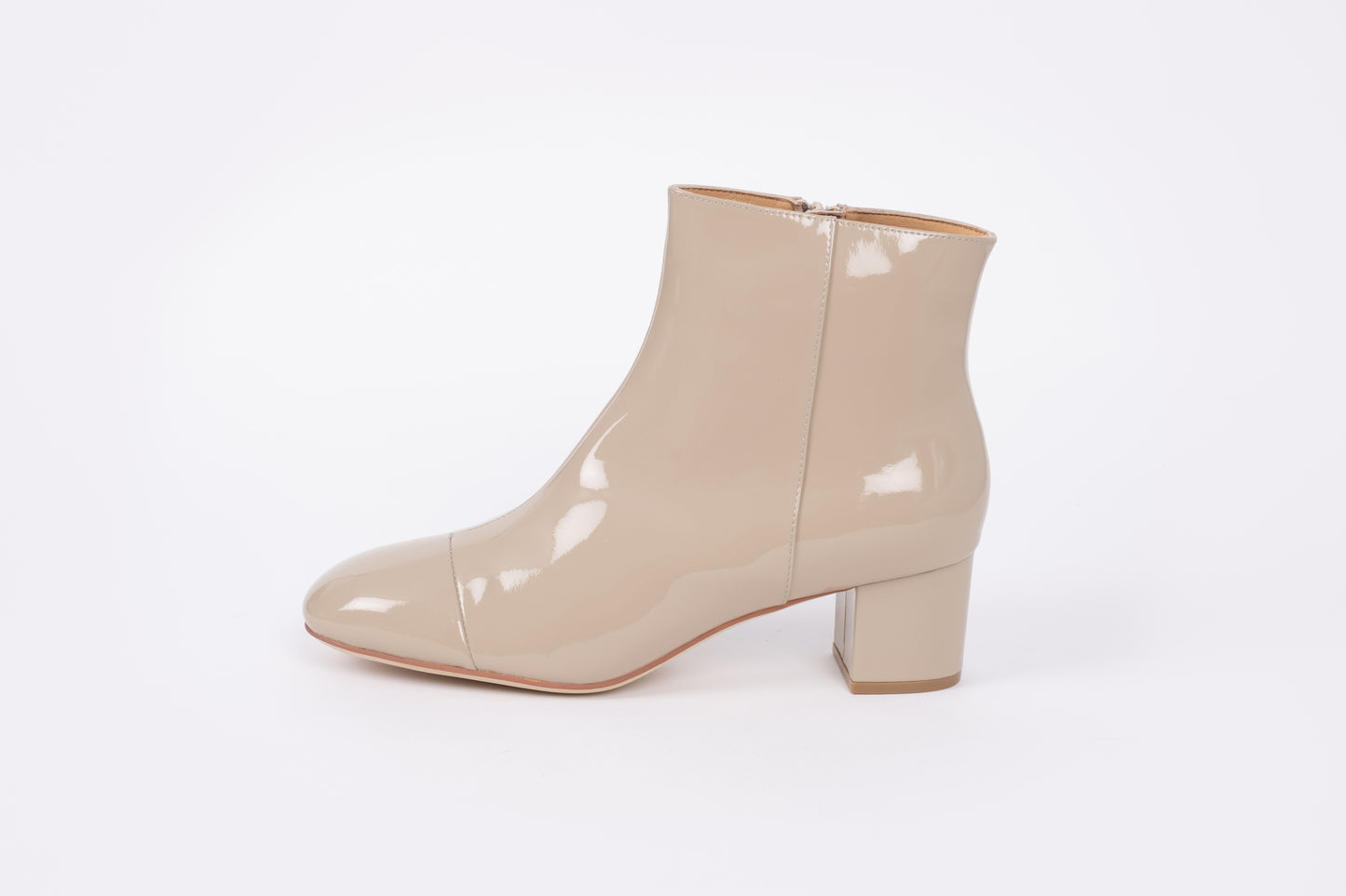 SIde profile of womens ankle boot, Izzy in Taupe. Available in European sizes 42-46