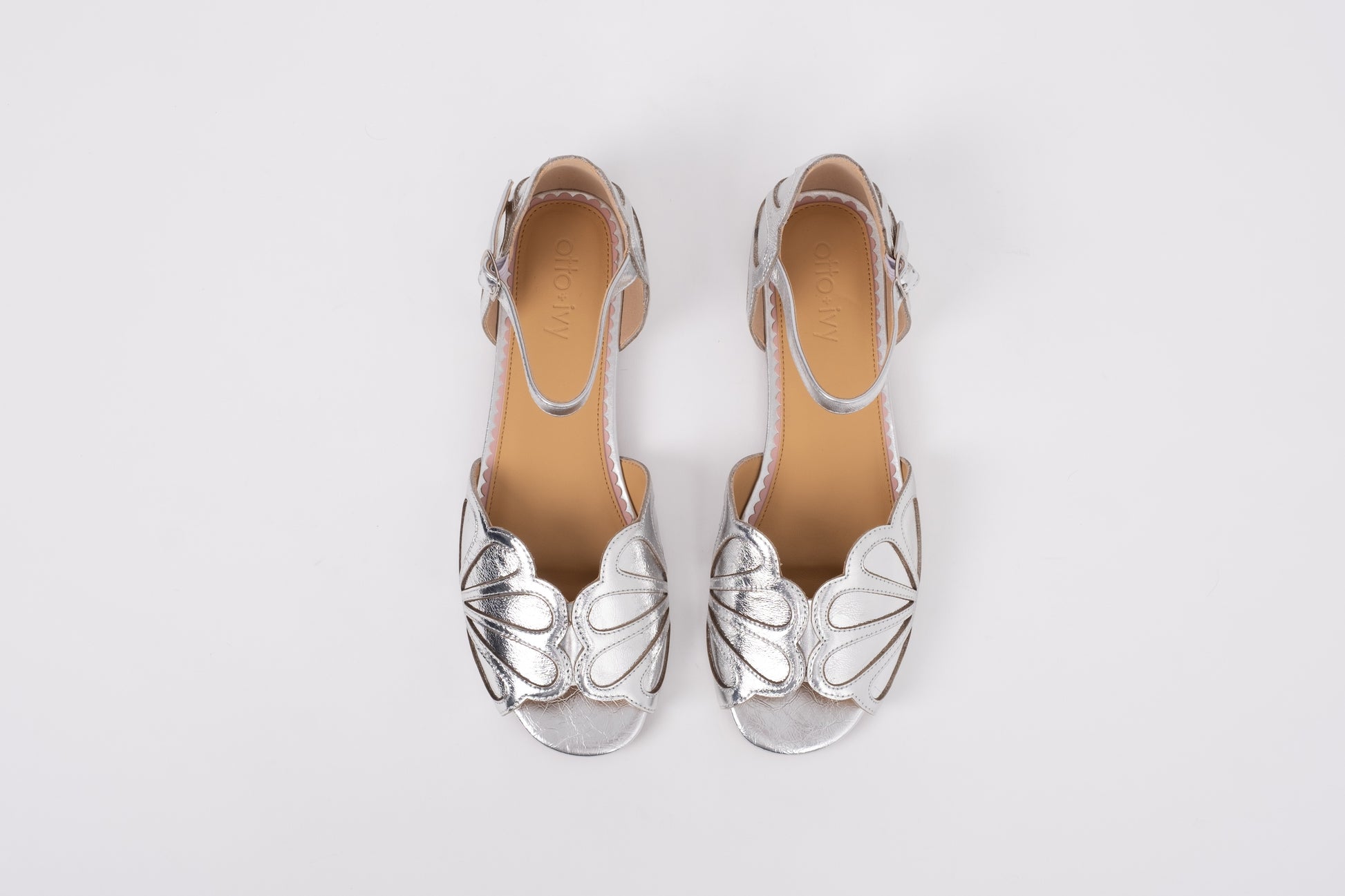 Aerial shot of women's silver sandal in larger sizes