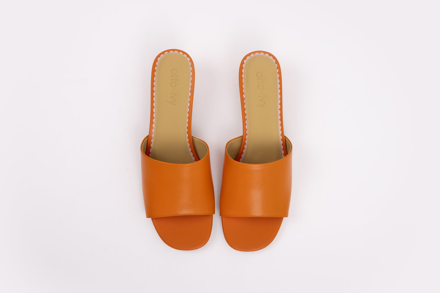 Aerial shot of orange womens heeled slip on sandal in larger sizes 8 9 10 11 12