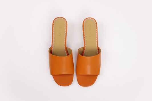 Aerial shot of orange womens heeled slip on sandal in larger sizes 8 9 10 11 12