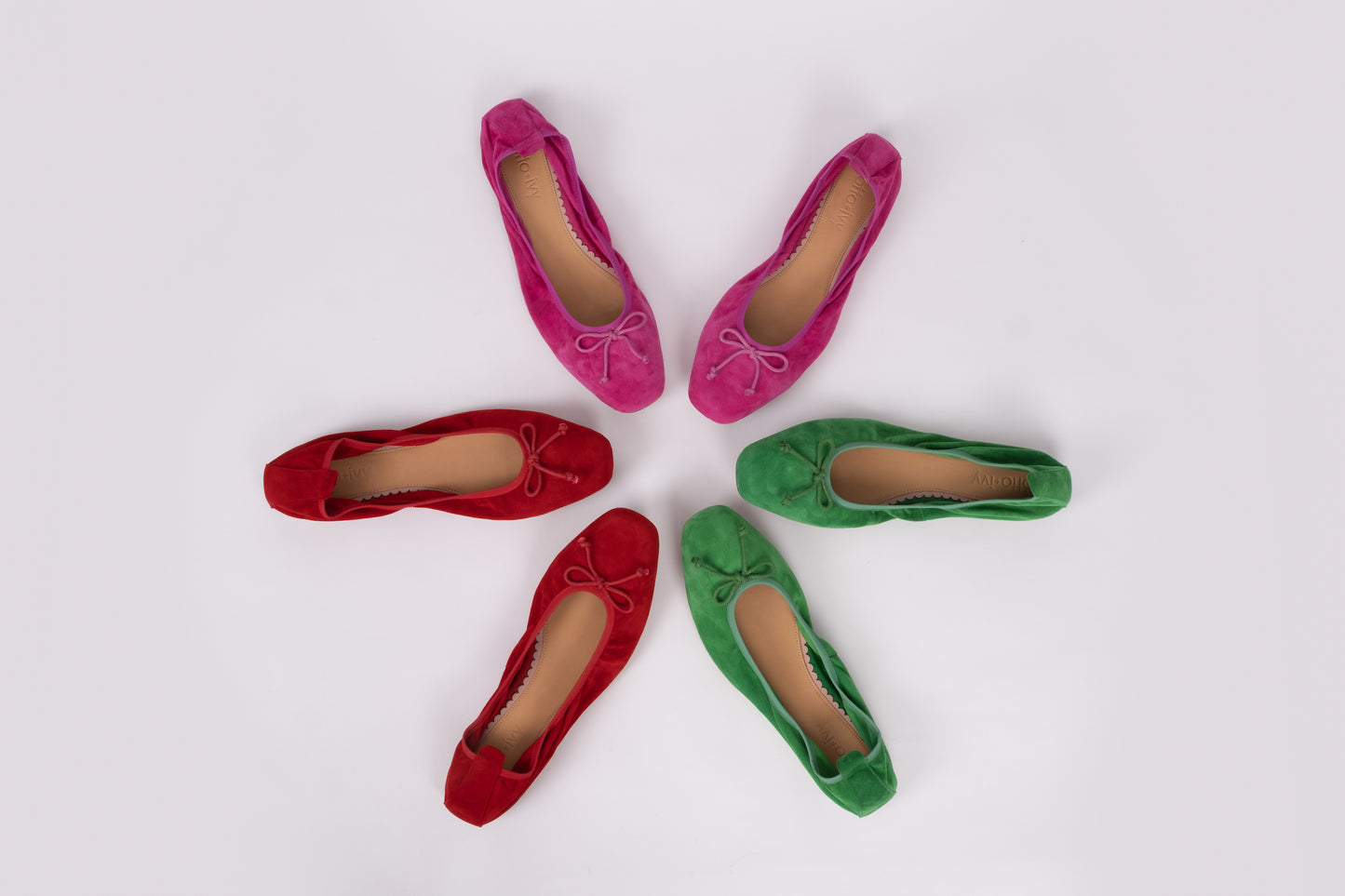 Aerial view of Olivia flats in 3 different colours, red, fuchsia and green. In larger womens sizes UK 8-13