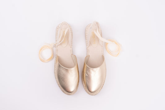 Aerial view of Clara Espadrille shoe in Gold. Tie up womens shoe available in larger sizes 8-12