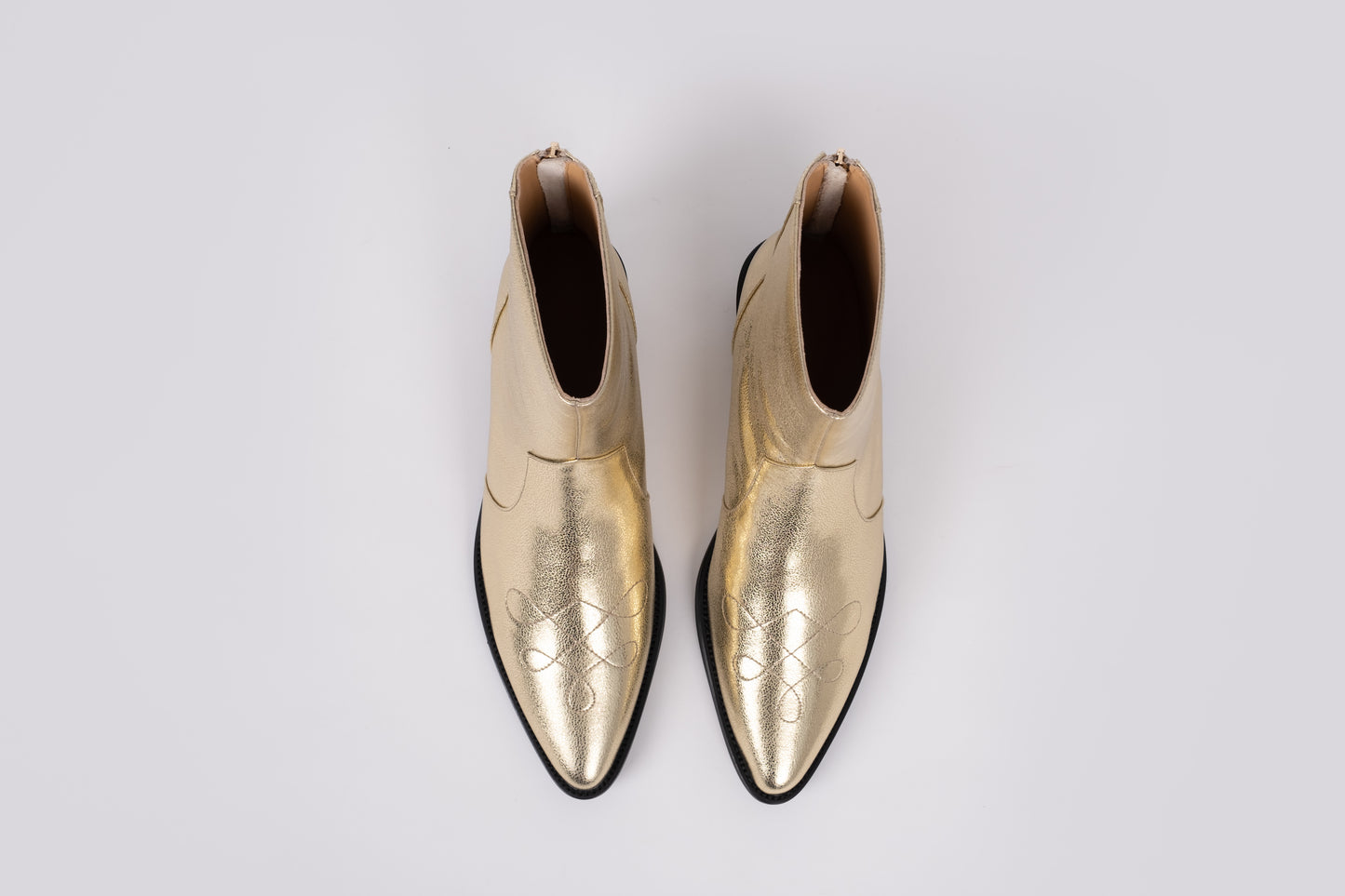 Aerial view of Gold Phoebe boot. Cowboy style womens ankle boot available in larger sizes UK 8-12