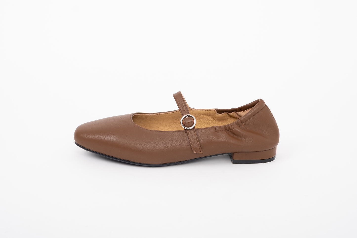 Side shot of womens brown leather flat shoe in large sizes 8 9 10 11 12