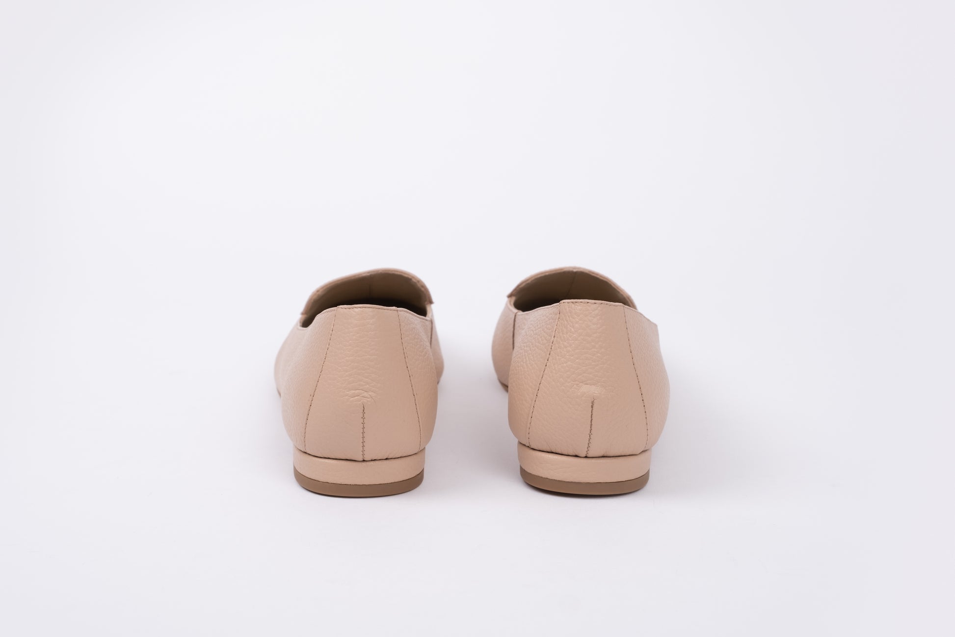 Back shot of Aubrey flat shoe in beige. Womens footwear available in womens European larger sizes 42-46