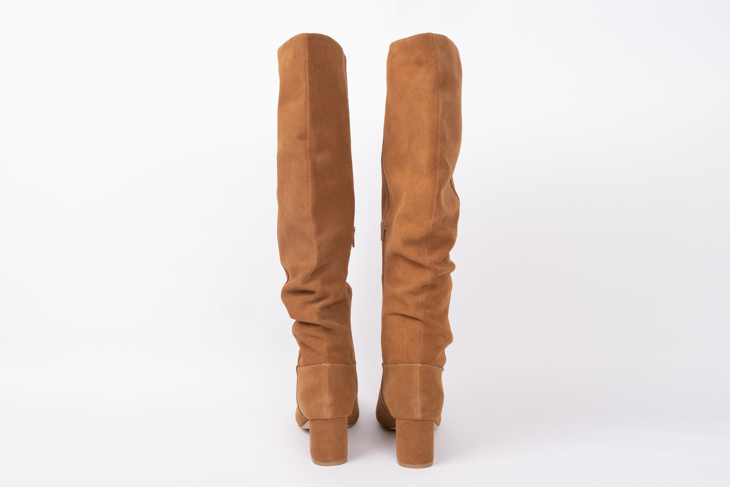 Back view of Evelyn Boot in Camel suede. Heeled knee-high boot available in larger sizes 8-12