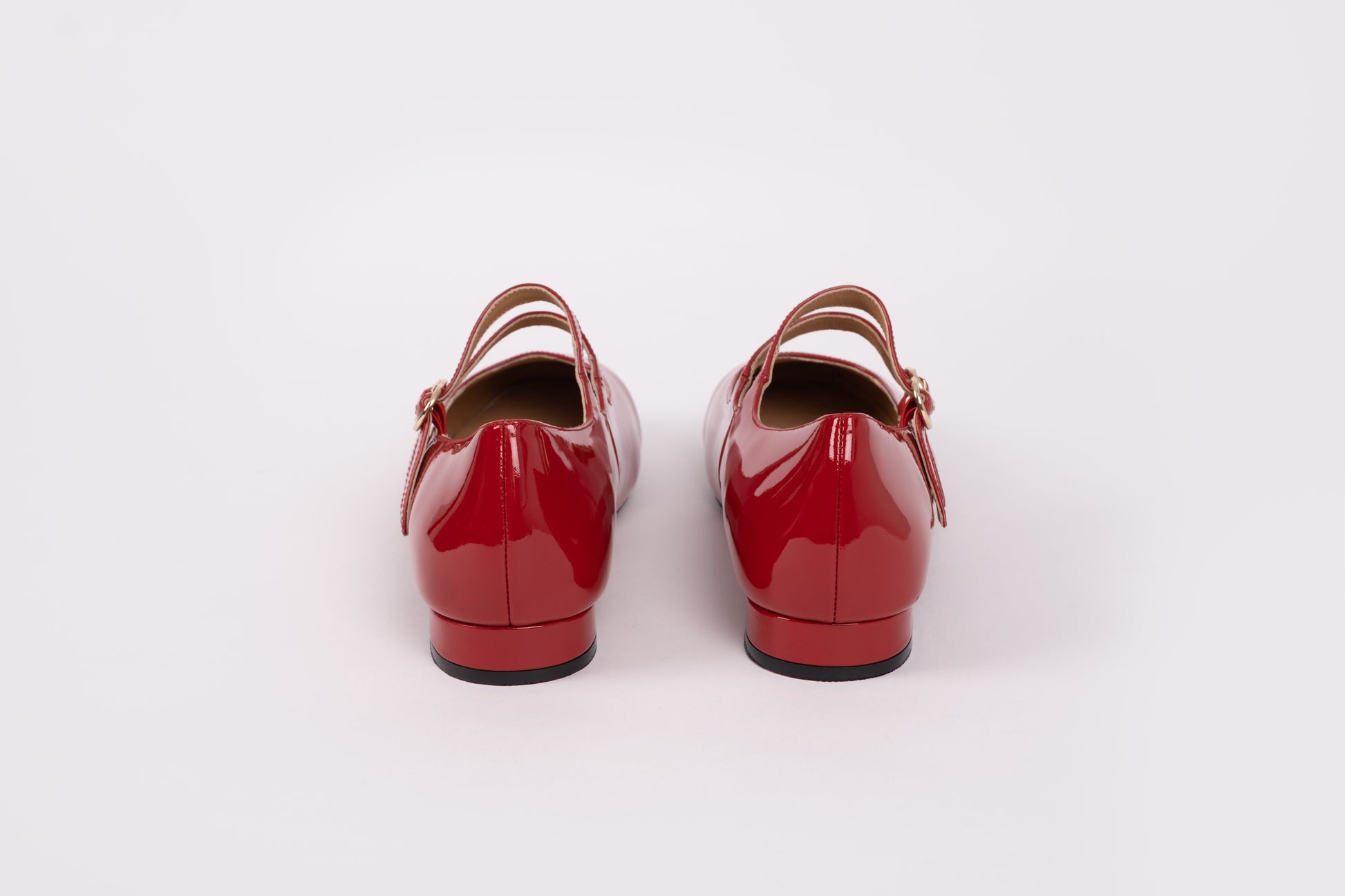 Back shot of Jemima Flat, in red leather, 2 strap Mary Jane pump available in womens UK sizes 8-12