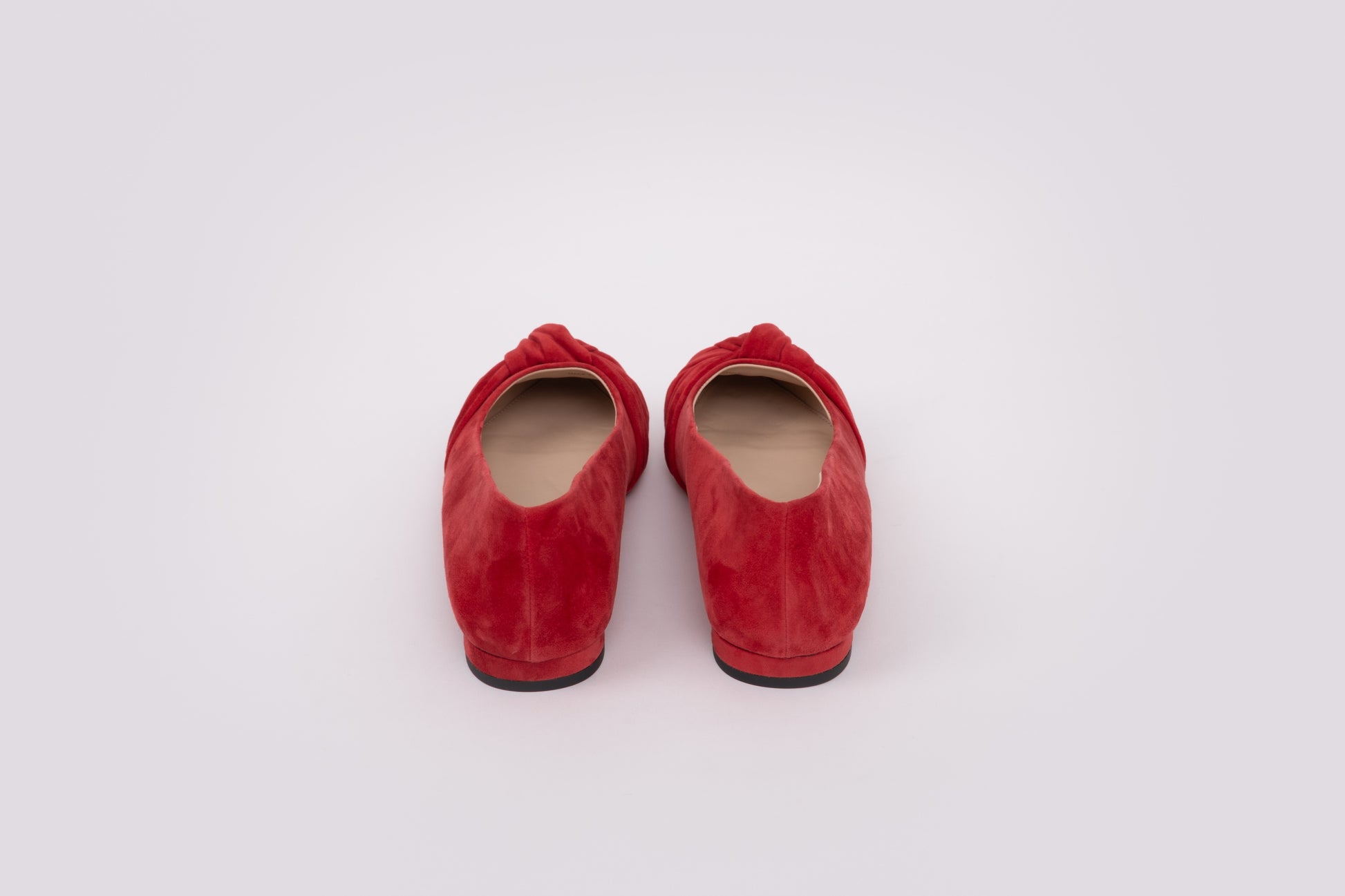 Back view of red womens flat shoe