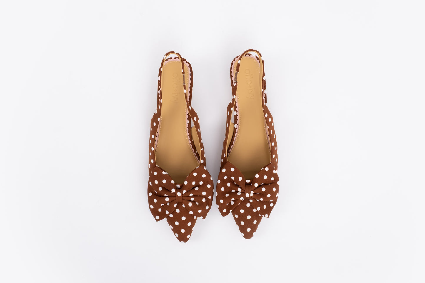 Aerial shot of womens bow slingback kitten heels in brown polkadot in larger sizes 42-46