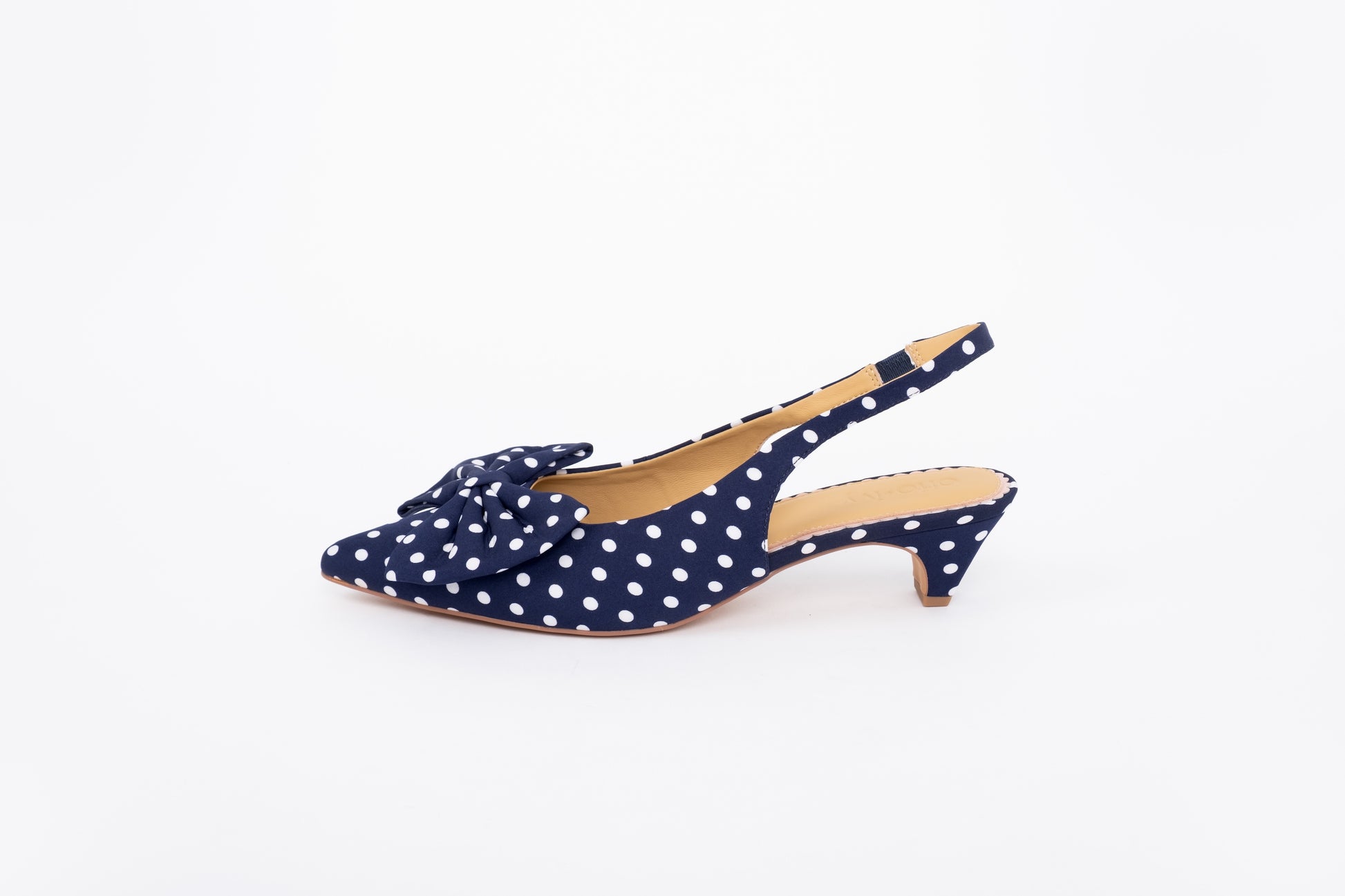 Side. shot of womens slingback navy heel available in larger sizes 42-46
