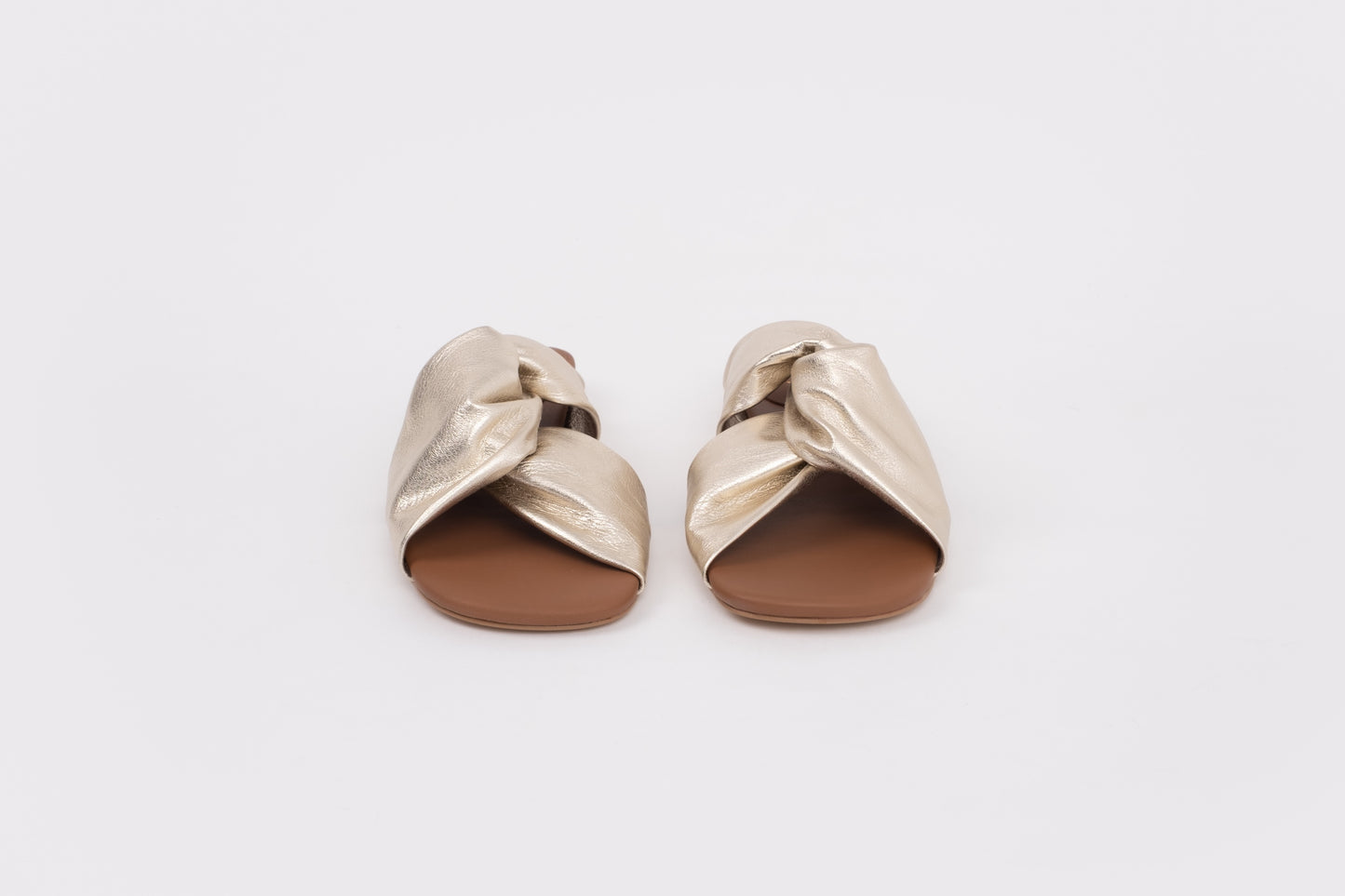 Front shot of gold lip on sandal available in larger womens sizes 42-46