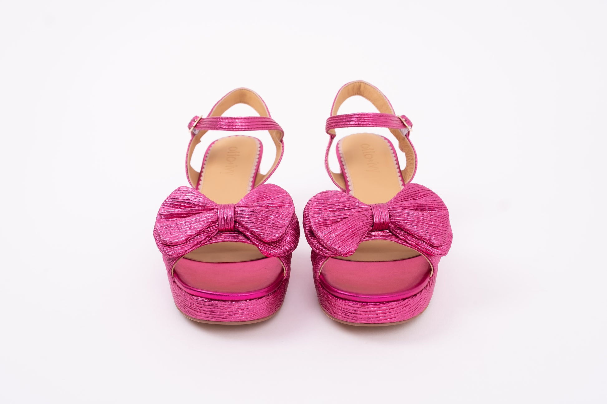 Front view of Rhian Sandals with Bow detail in Fuchsia pink. Available in larger  womens UK sizes 8-12