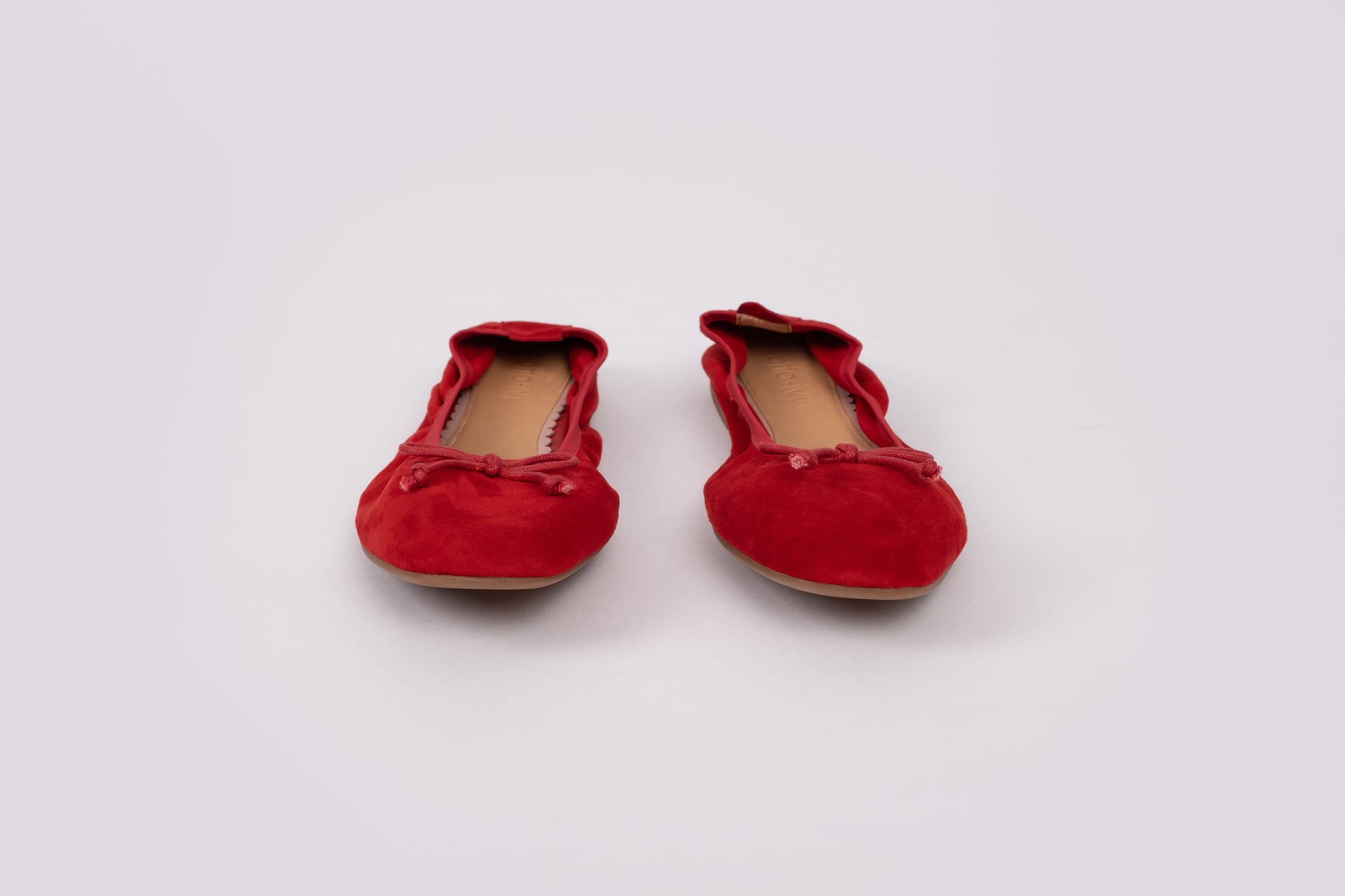 front view of Olivia in red. A flat womens shoe available in larger sizes UK 8-13