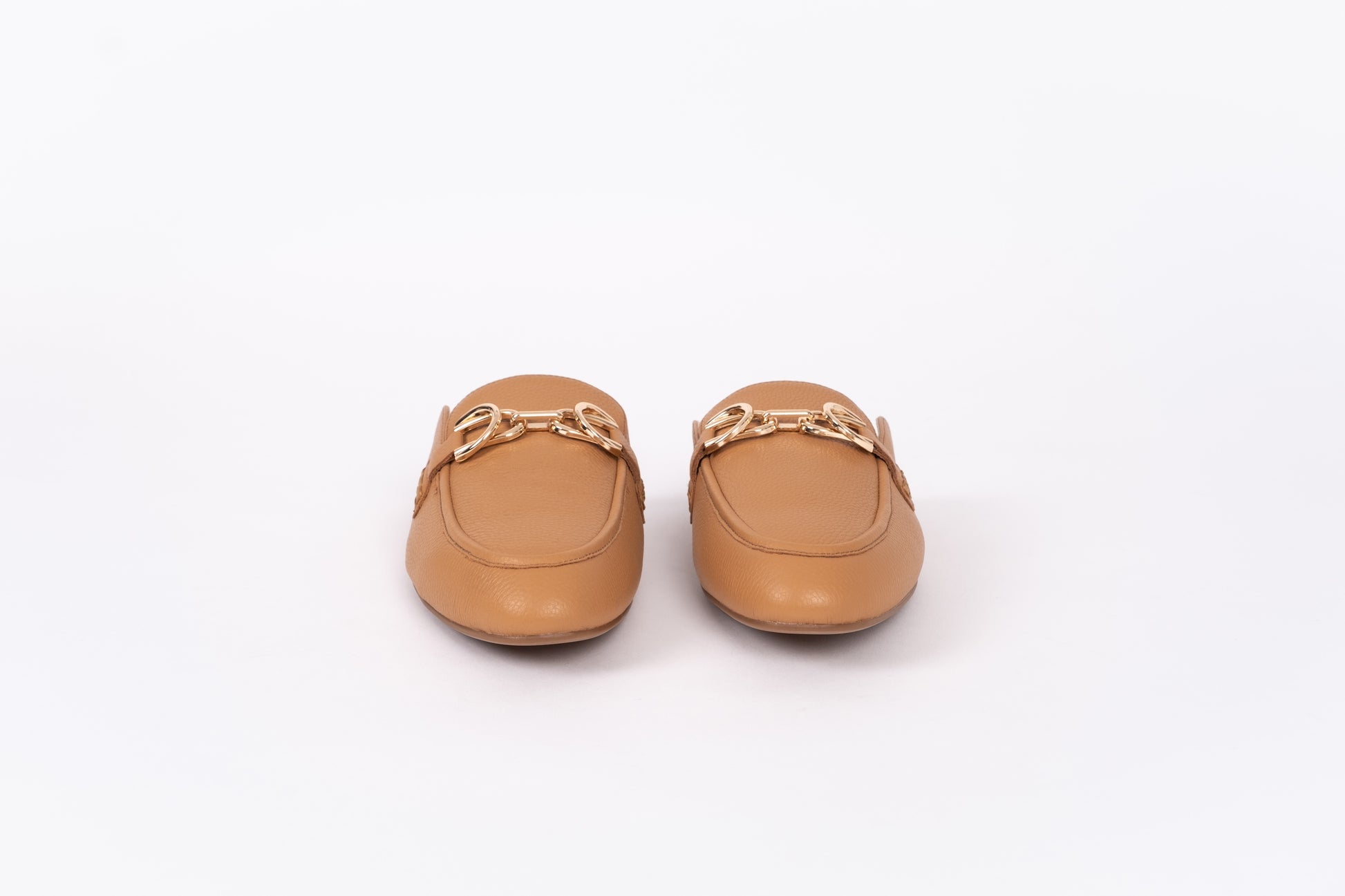 Front view of Chloe Mule in Tan. Womens slide on flat shoe available in UK sizes 8-12