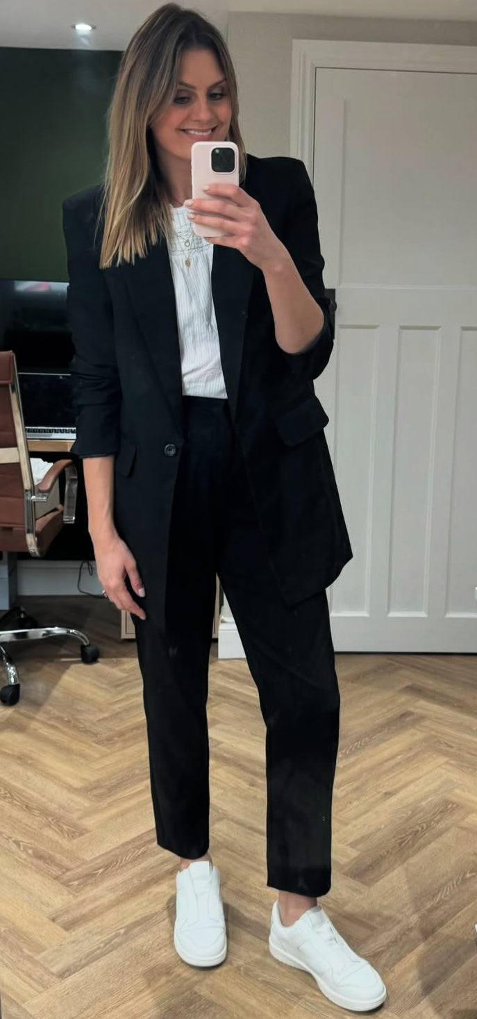 Stylish tall model wearing Aria Sneakers. Available in European sizes 42-46