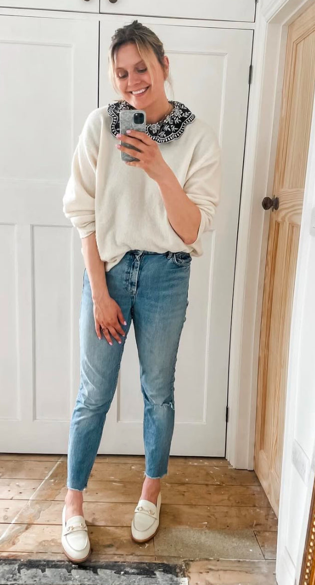 Tall model wearing Cream Betsy loafers. Available in large womens sizes 42-46