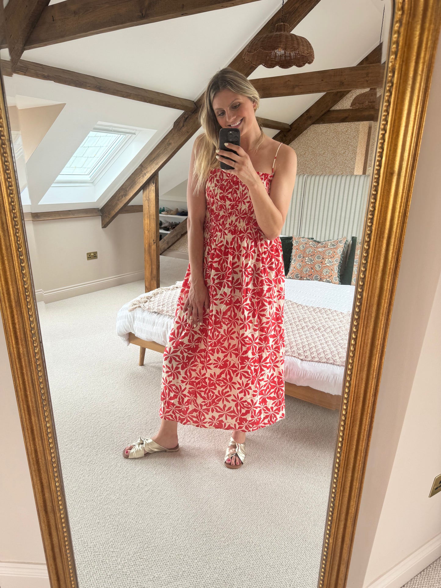 Tall woman wearing size 9 gold sandals
