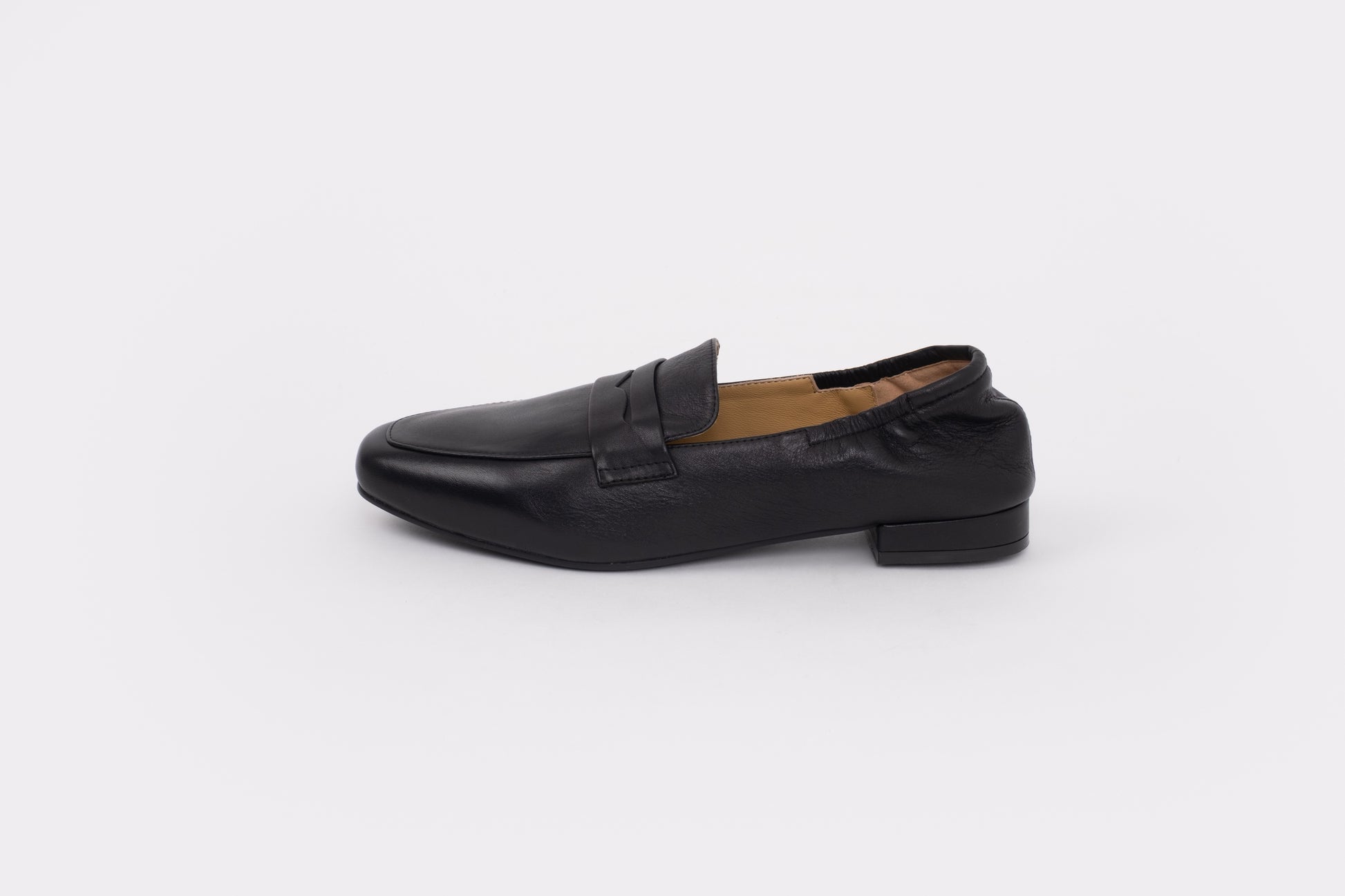 womens shoes in size 42-46 Black loafer shoe on a white background