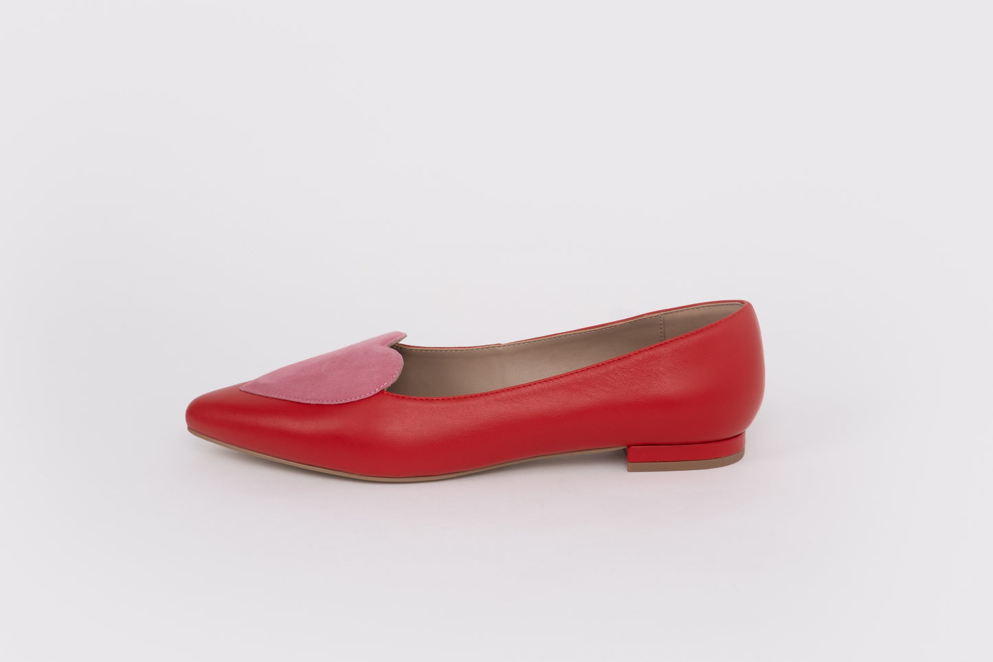 Side shot of red and pink flat shoe in sizes 8 9 10 11 12 standard and wide fit
