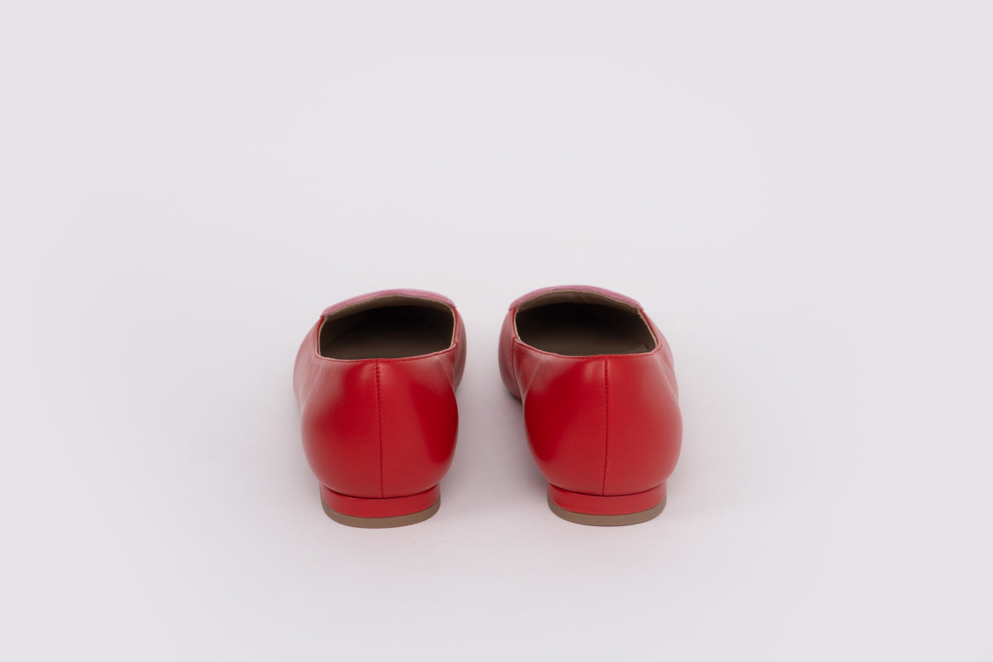 Back shot of womens red pink flat shoes in larger sizes 42-46