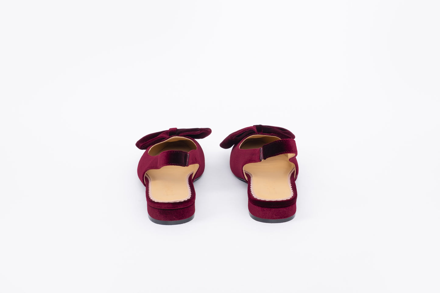 Back shot of womens berry velvet bow slingback flat shoe in larger sizes 42-46
