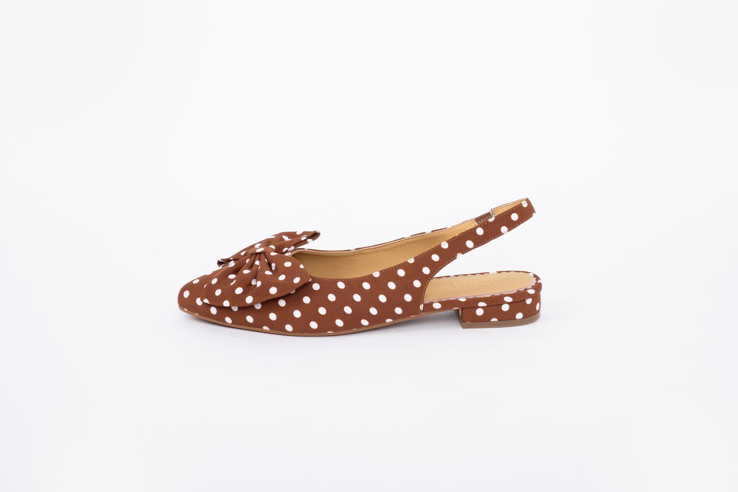 Side shot of womens brown polka bow slingback flat shoe in larger sizes 42-46