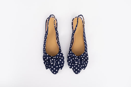 Aerial shot of womens navy polka dot bow slingback shoe in larger sizes 8-12