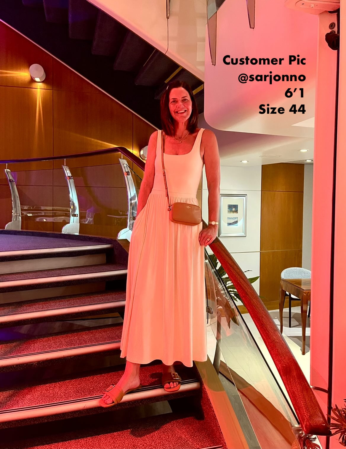 Tall woman wearing large sized leather sandals in size 44