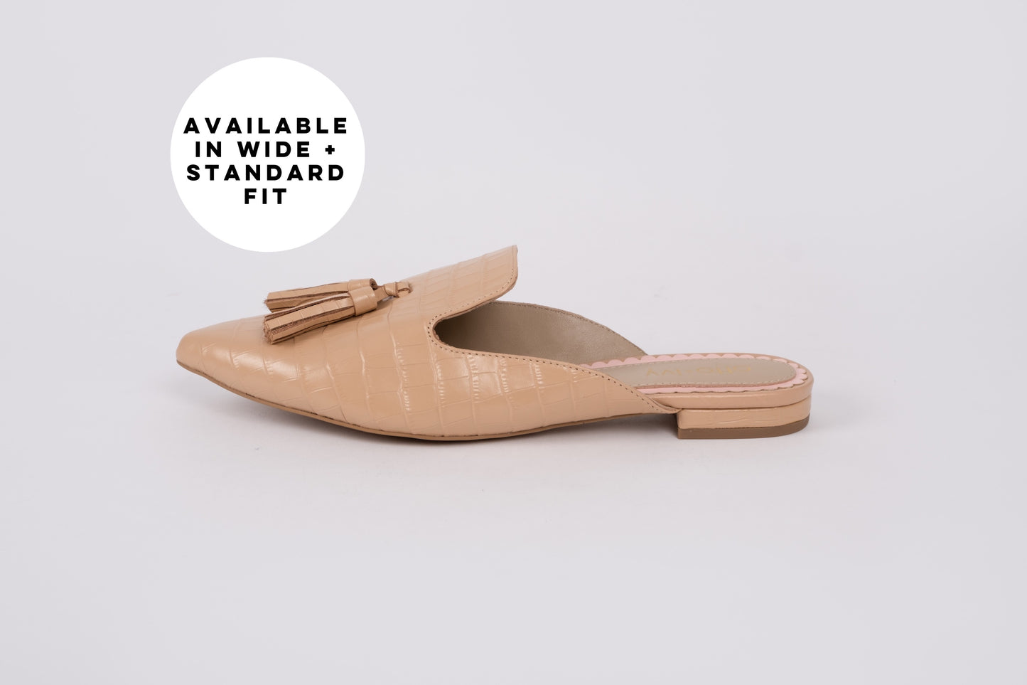 Side profile of Sienna Slider in beige croc. Womens slide on shoe available in womens UK sizes 8-12. Standard and wide fit.