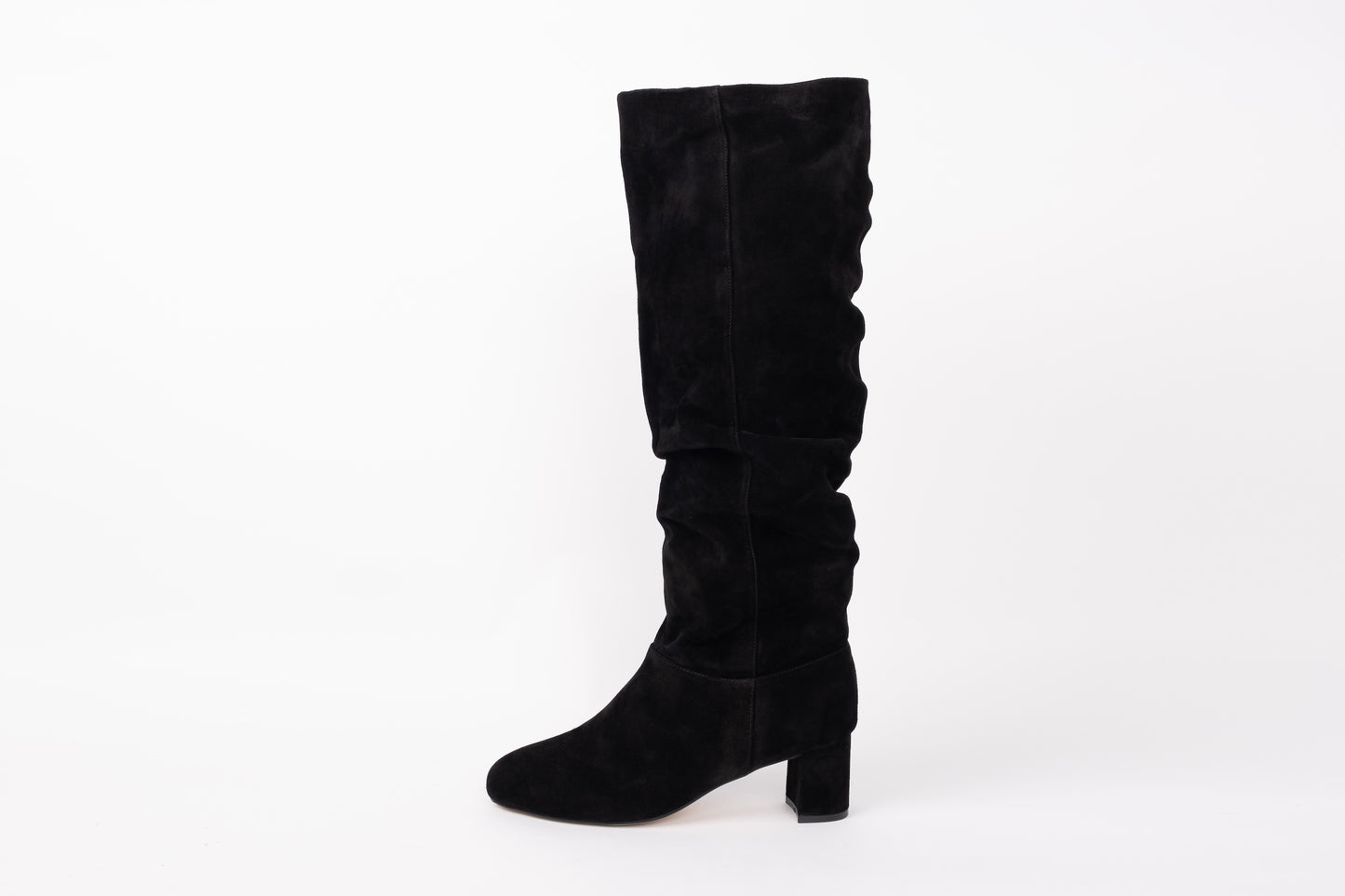 Side profile of womens boot Evelyn in black. A zip-up, knee-high, heeled, suede boot available in UK sizes 8-12