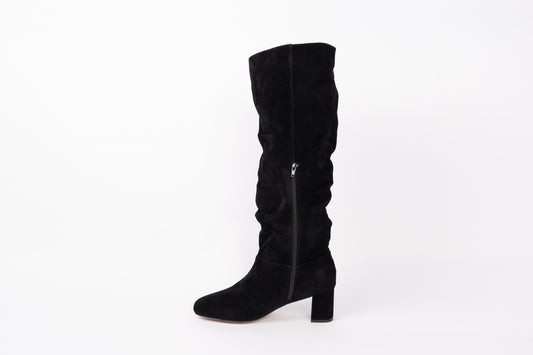 Opposite side profile of Evelyn boot displaying zip. Slouch knee high suede boot with heel. Available in European sizes 42-46