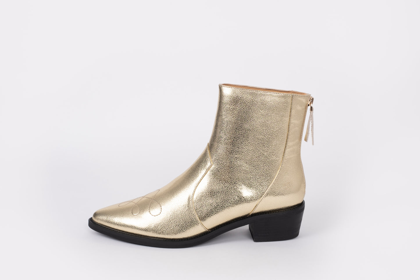 Side profile of Phoebe boot in Gold. Fun party boot available in larger sizes 42-46