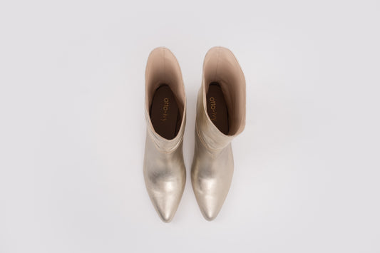 Aerial shot of womens gold boots in larger sizes 8 9 10 11 12