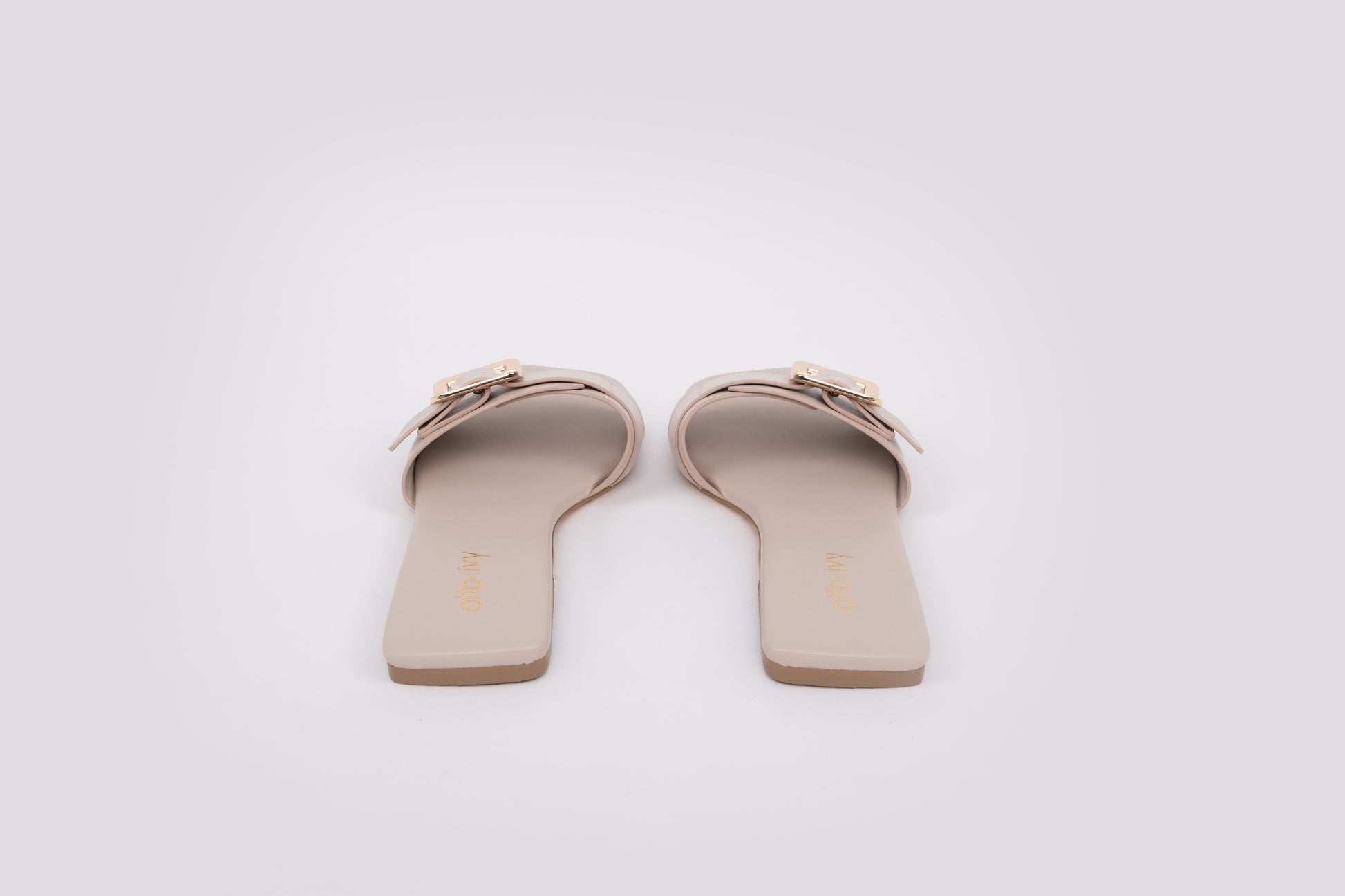 A back shot of the Ruby sandal in stone, a large size sandal available in European sizes 42-46