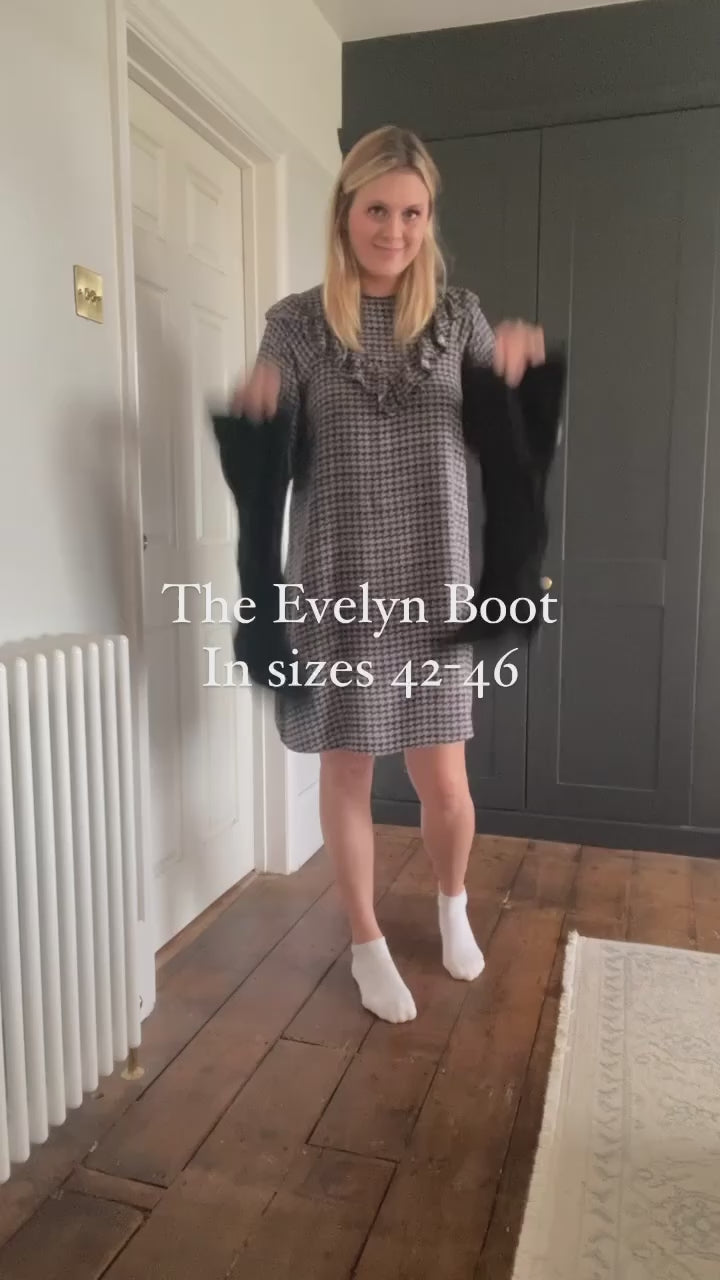 Tall woman modelling back evelyn boot. Available in larger sizes UK 8-12