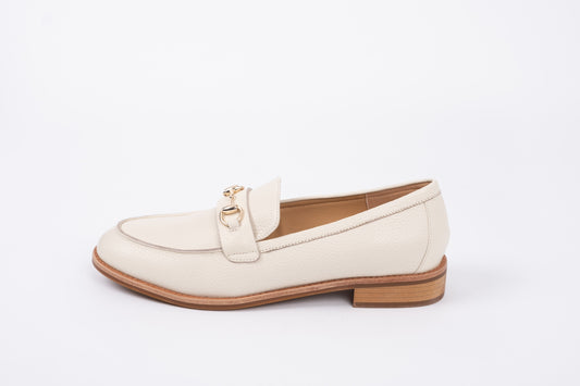 Side profile of Betsy Loafer in Cream. A womens flat shoe with buckle available in larger sizes 8-12