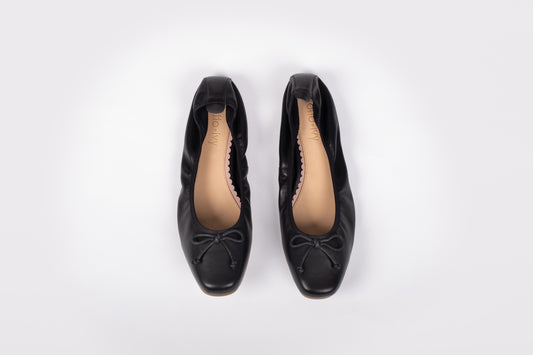 Aerial shot of Olivia Flats in black. A womens large sizes elasticated pump in Uk sizes 8-12