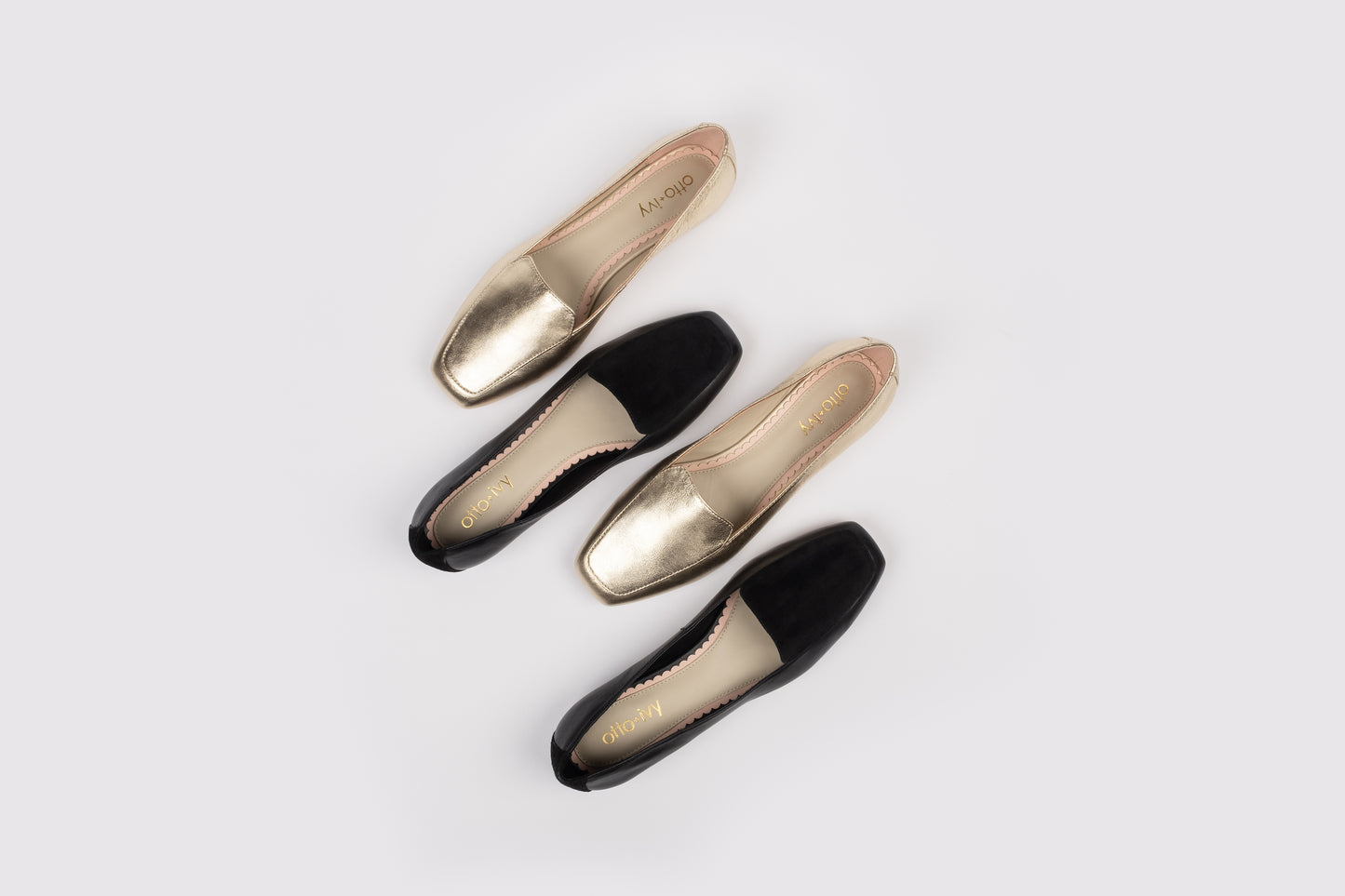 Aerial view of Aubrey loafers in black and gold. Available in womens European sizes 42-46