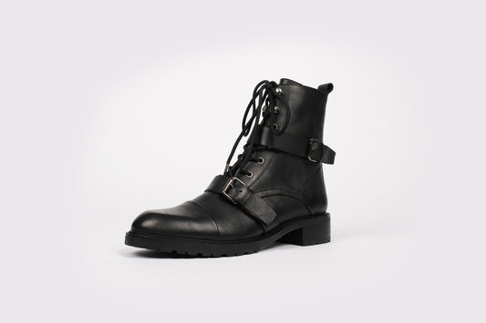 Maisie Boot by Otto and Ivy - a black biker boot for tall women with large feet, featuring silver buckles and black laces.