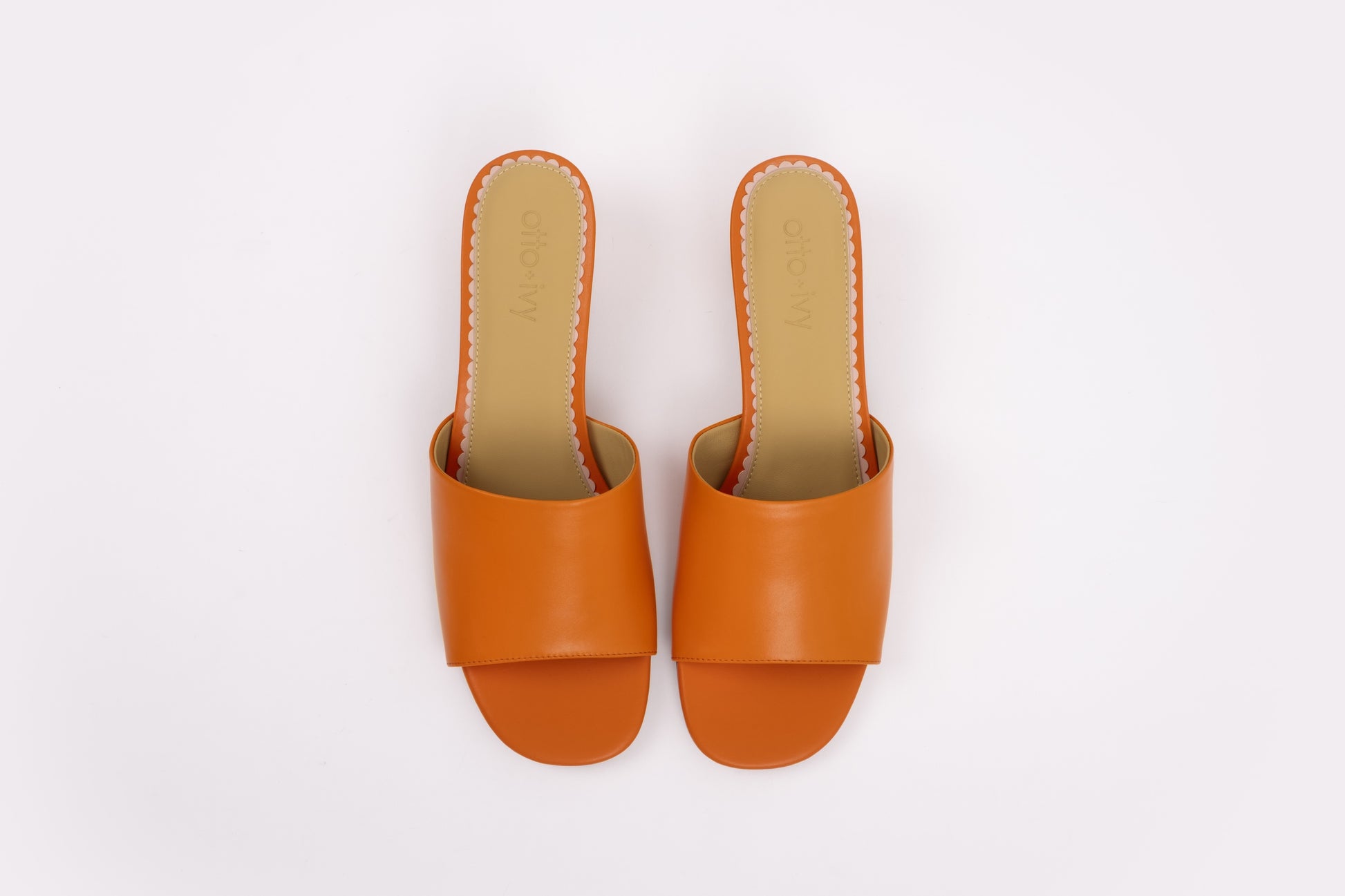 Aerial shot of orange womens heeled slip on sandal in larger sizes 8 9 10 11 12