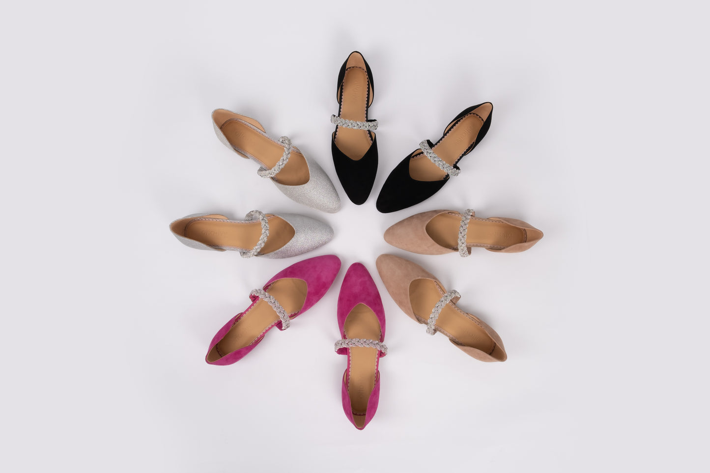Aerial shot of Amber flats in all 3 colours, Fuchsia, black and silver. Available in larger sizes UK 8-12
