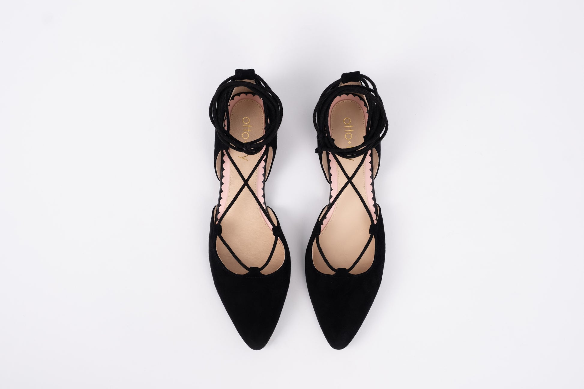 Aerial view of Winnie shoe in black. A Tie up womens pump available in larger  European sizes 42-46