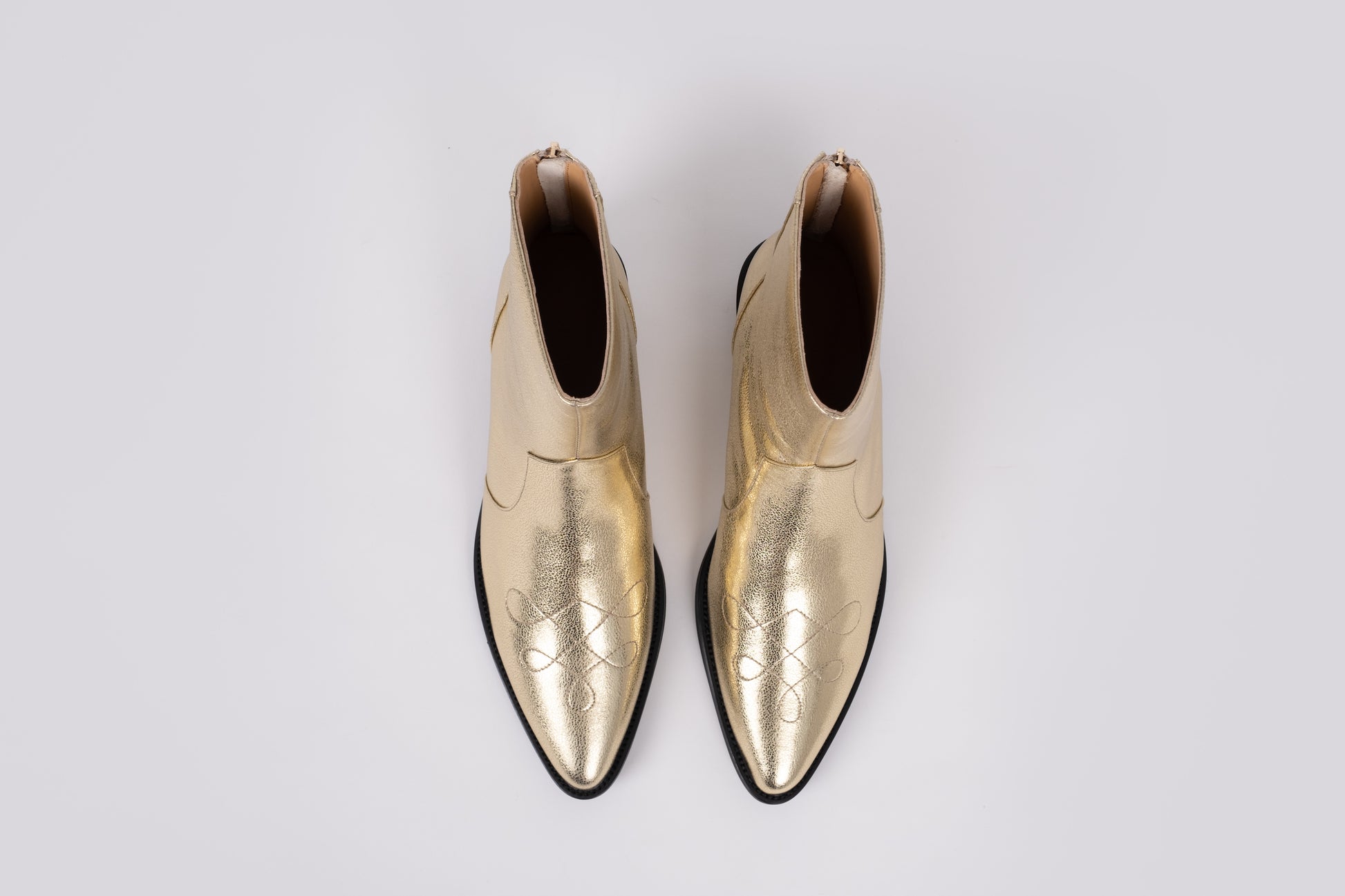 Aerial view of Gold Phoebe boot. Cowboy style womens ankle boot available in larger sizes UK 8-12