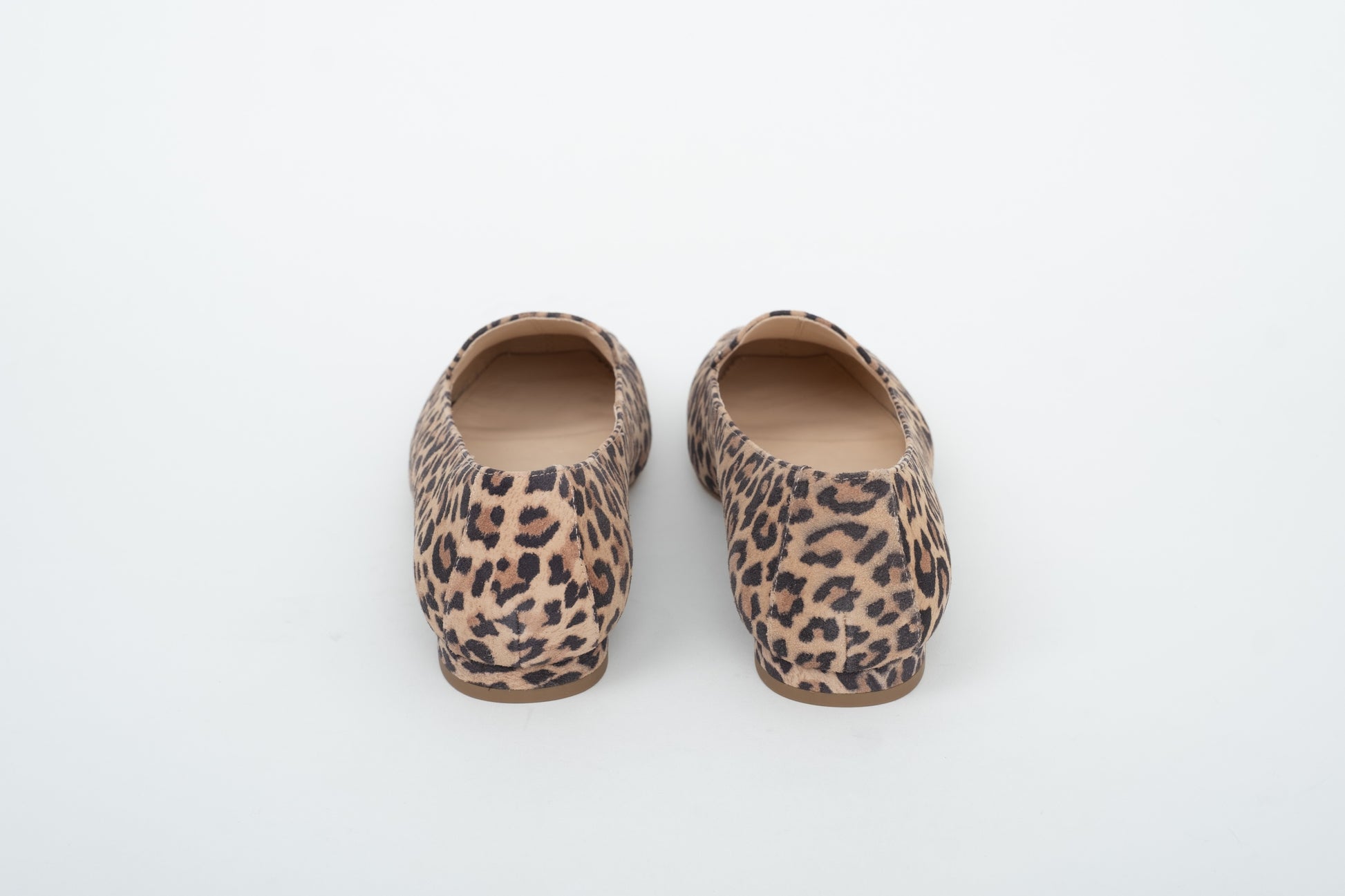Back shot of womens large sized leopard print suede flat shoe available in uk sizes 8-12 standard and wide fit.