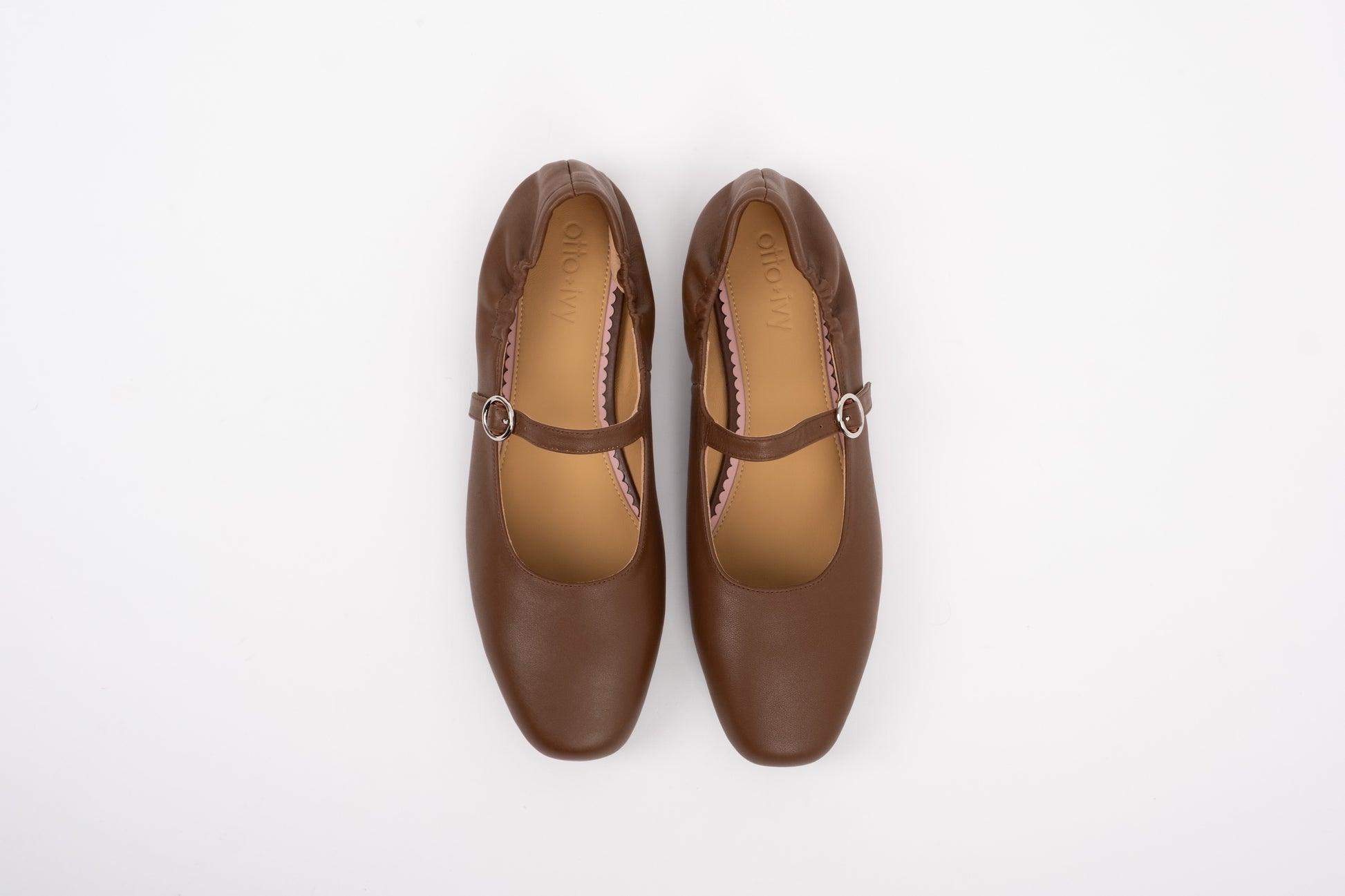 Aerial shot of womens chocolate brown leather Mary Jane one strap flat shoe in large sizes 8-12