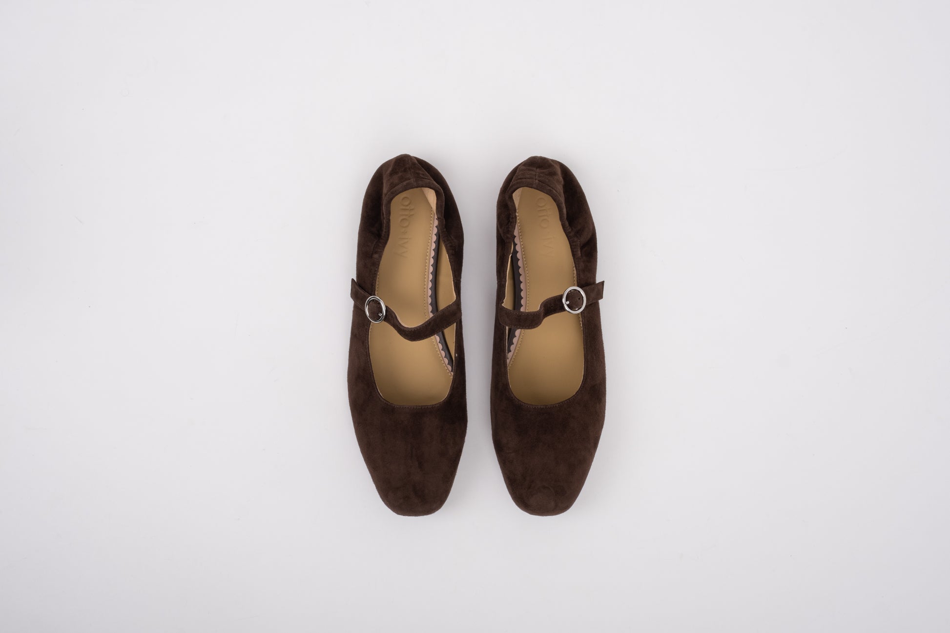 Aerial shot of womens large size chocolate brown suede Mary Jane shoes in sizes 42 43 44 45 46