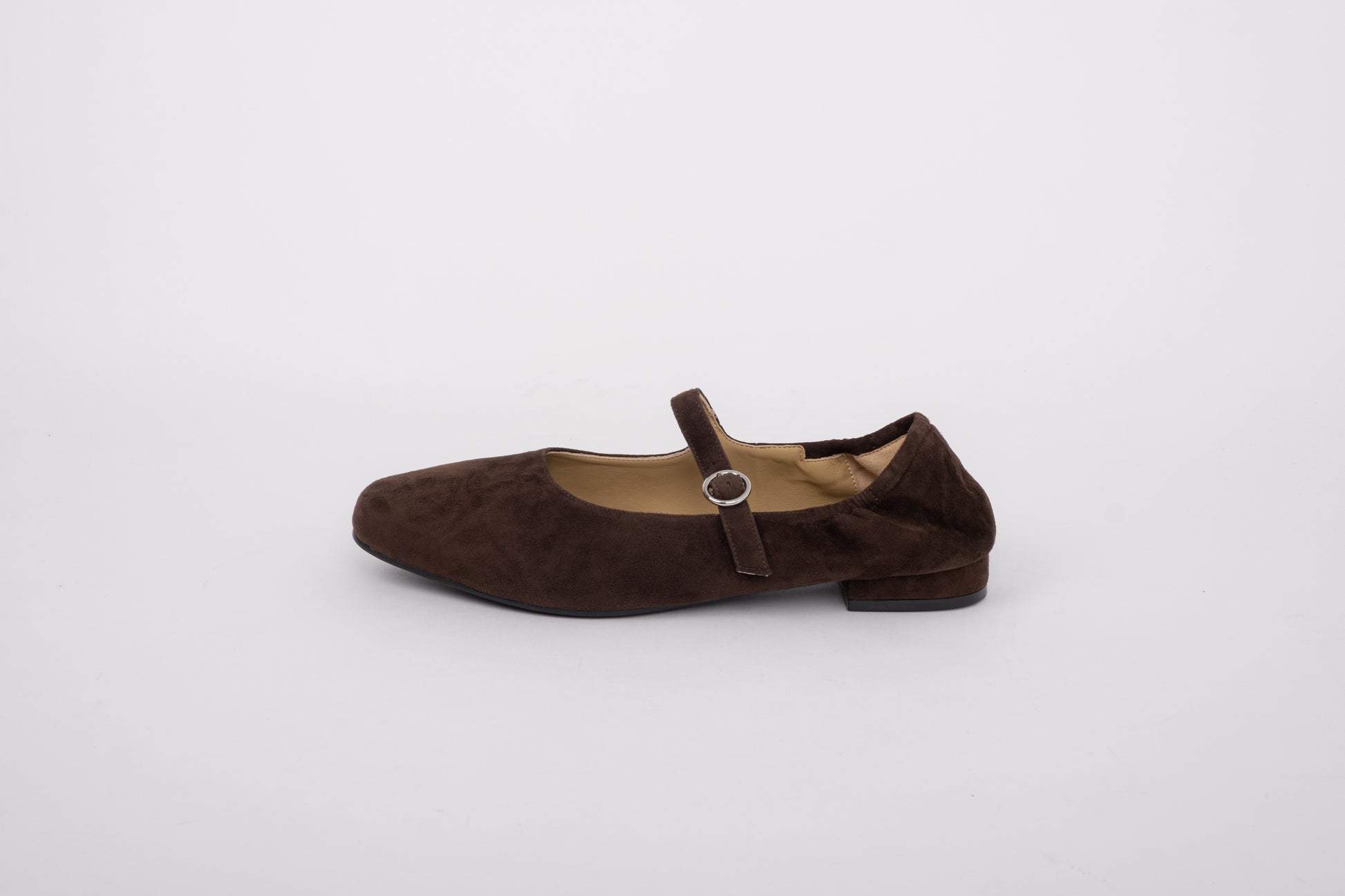 Side shot of womens large size stretch-back chocolate brown suede shoe in sizes 8-12