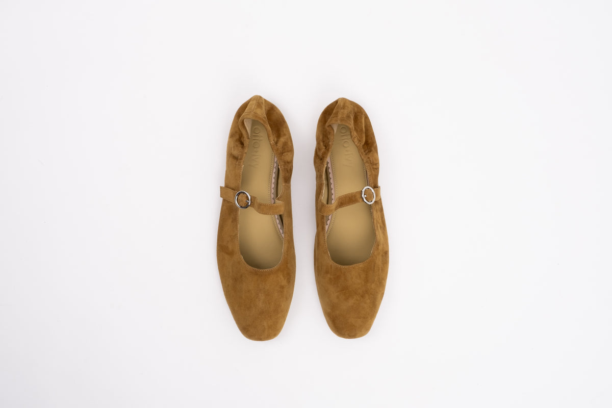 Aerial shot of womens tan suede Mary janes in larger sizes 8-12