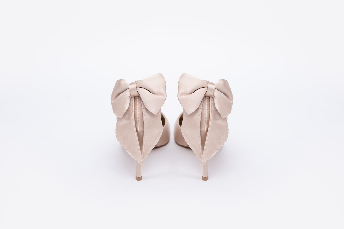 Back view of Annie Court in Champagne. Beautiful womens formal shoe with bow detail. Available in European sizes 42-46